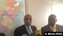 Visiting United Nations’ Assistant Secretary-General for Political Affairs Tayé-Brook Zerihoun (left) speaks on reporters in Harare 20 June 2018 while Zimbabwe Foreign minister Sibusiso Moyo looks on. 