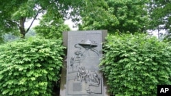 In the fictional 'War of the Worlds,' Martians land in the New Jersey town of Grover’s Mill. Years later, somebody put up this monument at the site, which is now part of a larger town.