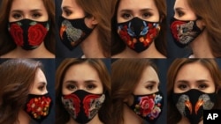 These Wednesday, April 15, 2020,combination photos, shows a woman wearing designs of embroidery masks at a fashion studio in Hanoi, Vietnam. (AP Photo/Hau Dinh)