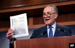 Senate Minority Leader Sen. Chuck Schumer of N.Y. speaks about the Republican tax reform plan on Capitol Hill in Washington, Nov. 9, 2017.