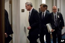 Former FBI Director Robert Mueller, the special counsel probing Russian interference in the 2016 election, departs Capitol Hill following a closed door meeting, Wednesday, June 21, 2017.