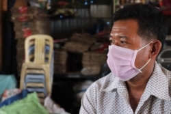 Businessman Mao Tran, 44, says business is slow during the coronavirus pandemic, in Phnom Penh, Cambodia, April 23, 2020. (Phorn Bopha/VOA Khmer)