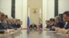 Russian President Vladimir Putin (C) chairs a meeting of the new Cabinet team in Moscow's Kremlin, May 21, 2012. 