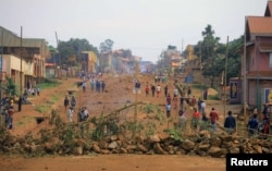 Demonstrators barricade a road during protests over their exclusion from the presidential election in Beni, Democratic Republic of Congo, Dec. 28, 2018.