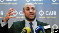 FILE - Attorney Gadeir Abbas speaks during a news conference at the Council on American-Islamic Relations (CAIR) in Washington, Jan. 30, 2017. 