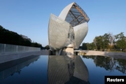 A general view shows the Fondation Louis Vuitton designed by architect Frank Gehry in the Bois de Boulogne, western Paris, Oct. 1, 2014.