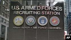 A U.S. Armed Forces Career Center sign is New York