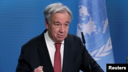 U.N. Secretary-General Antonio Guterres addresses the media during a joint news conference with German Foreign Minister Heiko Maas after a meeting in Berlin, Germany, December 17, 2020. Michael Sohn/Pool via REUTERS