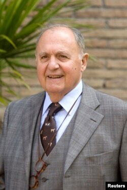 FILE - Paolo Savona is pictured during a meeting in Rome, April 11, 2011.