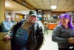Terry Stinson, left, talks with Deborah Harmon at the Frosty Freeze restaurant in Sandy Hook, Ky., Dec. 14, 2017.