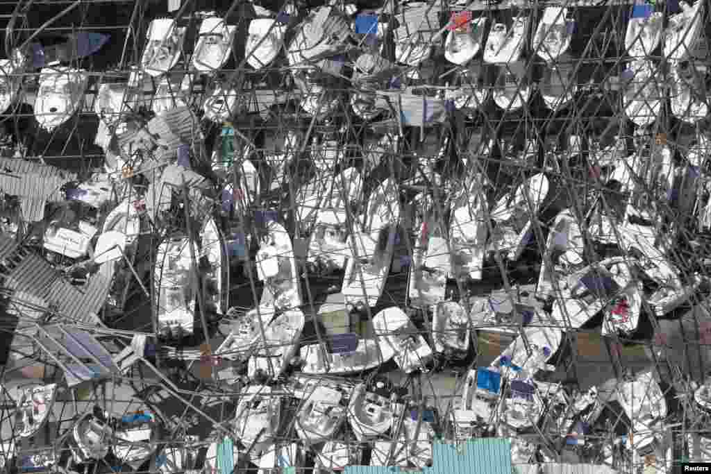 Boats under a destroyed building are seen during a post-Hurricane Michael flight by a U.S. Customs and Border Protection helicopter near Panama City, Florida, October 11, 2018.