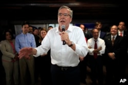 FILE - Former Florida Gov. Jeb Bush speaks during a town hall meeting with Puerto Rico's Republican Party in Bayamon, Puerto Rico, April 28, 2015.