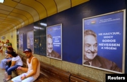 Hungarian government posters portraying financier George Soros and saying "Let's not allow Soros to have the last laugh!" are seen at an underground stop in Budapest, Hungary, July 11, 2017.