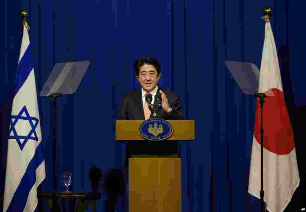 Japan&#39;s Prime Minister Shinzo Abe speaks during a press conference in Jerusalem. During his visit to the Middle East, the Islamic State group threatened to kill two Japanese hostages unless they receive $200 million in 72 hours, Jan. 20, 2015.