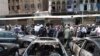 Burnt out cars at site of blast in Damascus June 28, 2012