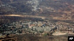 Dalam foto udara tertanggal 20/9/2010 ini, terlihat permukiman warga Israel di wilayah Tepi Barat. Israel mengumumkan rencana pembangunan 1.400 rumah di Tepi Barat dan Yerusalem Timur, wilayah yang diinginkan Palestina sebagai bagian dari negara Palestina yang berdiri sendiri. 