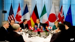 President Obama gathers with G7 world leaders in The Hague, March 24, 2014.