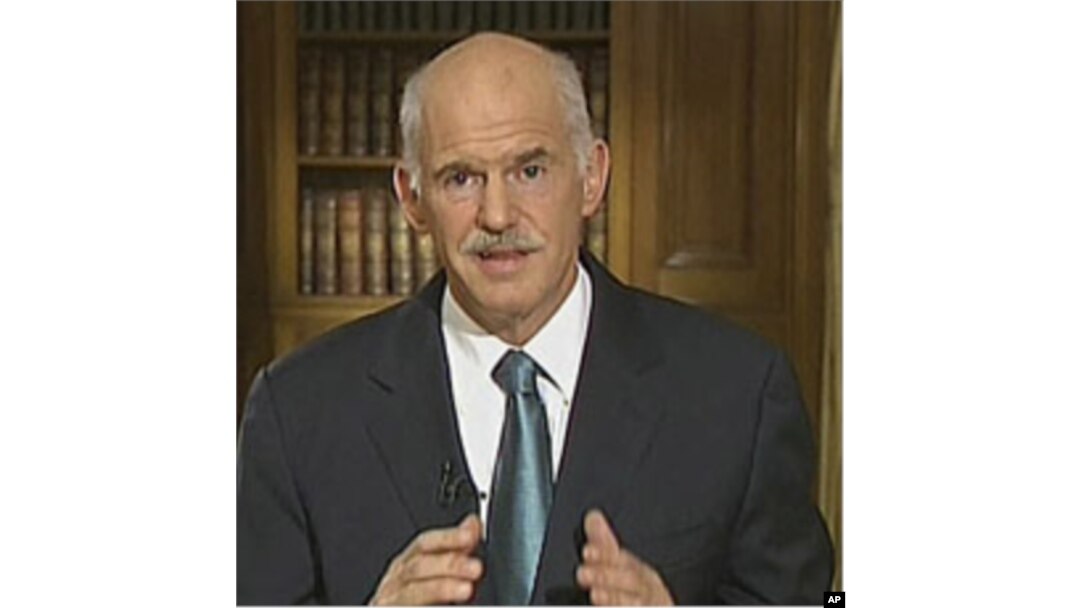 In this image taken from TV, Greek Prime Minister George Papandreou, talks to the nation in a live TV broadcast, June 15, 2011, in Athens