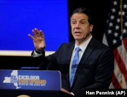 In this January 11, 2017 photo, New York Governor Andrew Cuomo gives a speech about the Excelsior Scholarship at one of his state of the state addresses at State University of New York in Albany, New York.