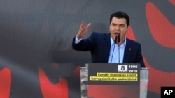 Albania’s main opposition Democratic Party leader Lulzim Basha speaks at an anti-government rally in downtown Tirana, Dec. 8, 2015.