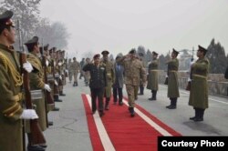 In this picture released by Pakistan's army, General Raheel Sharif is seen arriving at the Presidential palace in Kabul.