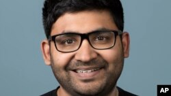 In this image provided by Twitter, Parag Agrawal poses for a picture. The newly named Twitter CEO Agrawal has emerged from behind the scenes to take over one of Silicon Valley's highest-profile and politically volatile jobs.