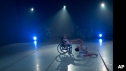 Dancer Sendoa Quijada performs in his wheelchair in the contemporary dance production Ubuntu, at the Teresa Carreno Theater in Caracas, Venezuela, Dec. 4, 2018.