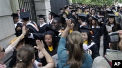 Friends and family greet students in the graduating class of 2012 at Princeton University following commencement ceremonies in Princeton, New Jersey, on June 5. More than 1,200 undergraduates were awarded degrees.