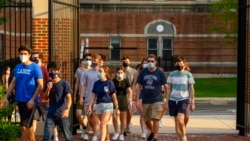Georgetown University students walk through campus during a summer program in June 2021.