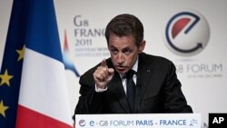 France's President Nicolas Sarkozy gestures, during a e-G8 conference, gathering Internet and information technologies leaders and experts, in Paris, May 24, 2011.