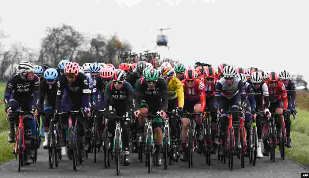The pack rides during the 212-kilometer third stage of the 78th Paris - Nice cycling race stage between Chalette-sur-Loing and La Chatre.