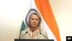 U.S. Secretary of State Hillary Clinton pauses during a joint news conference with India's Foreign Minister Somanahalli Mallaiah Krishna (unseen) in New Delhi May 8, 2012.