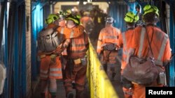 Miners leave after working the final shift at Kellingley Colliery on its last day of operation in north Yorkshire, England, Dec. 18, 2015. Kellingley is the last deep coal mine to close in England.