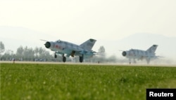 Planes are seen during the Wonsan Air Festival 2016 in Wonsan, in this undated photo released by North Korea's Korean Central News Agency (KCNA) in Pyongyang on September 26, 2016.