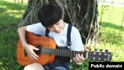 The sentence "I am excited about learning to play the guitar" follows the adjective-preposition-gerund sentence structure in today's grammar lesson.