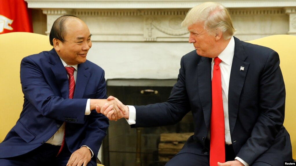 Image result for U.S. President Donald Trump greets Vietnamese Prime Minister Nguyen Xuan Phuc