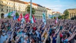 FILE - Demonstrators take part in an anti-government protest in Budapest, June 5, 2021, to demonstrate against the right-wing Fidez party of Prime Minister Viktor Orban.