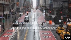 A usually busy 42nd Street is seen nearly empty on March 23, 2020 in New York City. The city, known as the center of finances, has the highest number of confirmed cases of COVID-19 in the United States. (Angela Weiss / AFP)