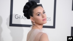 Katy Perry arrives at the 56th annual Grammy Awards at the Staples Center, Jan. 26, 2014, in Los Angeles. 