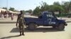 Un policier monte la garde près du site d'un attentat suicide à Ndjamena, au Tchad, le 11 juillet 2015. 