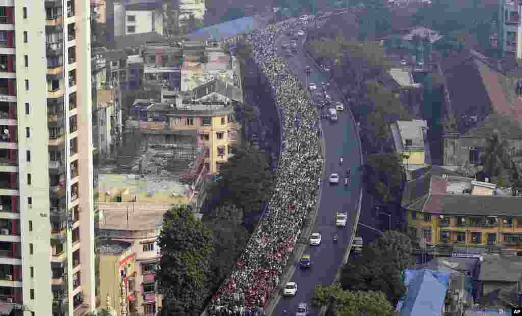 Members of Lok Sangharsh Morcha, an organization that comprises of tribals and farmers across Maharashtra state, participate in a protest in Mumbai, India, Nov. 22, 2018, to demand a loan waiver, drought compensation, and transfer of forest right to tribals.