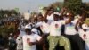 Supporters of Edgar Lungu, leader of the Patriotic Front, celebrate after Lungu narrowly won re-election, in a vote that rival Hakainde Hichilema rejected on claims of alleged rigging by the electoral commission, in Lusaka, Zambia, Aug. 15, 2016.