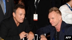 FILE - Honoree Bruce Springstein (L) and singer Sting attend MusiCares Person Of The Year Honoring Springsteen at Los Angeles Convention Center on Feb. 8, 2013 in California. 