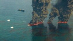 A US Coast Guard picture of attempts in May to control oil in the Gulf of Mexico through burning