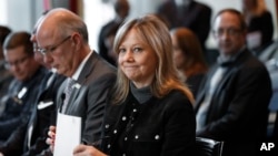 FILE - General Motors Chairwoman and Chief Executive Officer Mary Barra waits to speak at an event in Detroit, Michigan, Dec. 15, 2016.