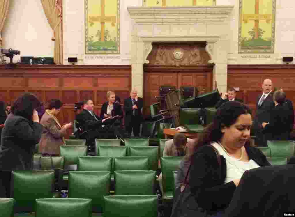 The Conservative Party caucus room is seen shortly after shooting began on Parliament Hill in Ottawa in this image taken and provided by MP Nina Grewal. 