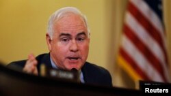 FILE - "Iran shouldn't get one red cent in U.S. sanctions relief until it has paid its victims what they are owed," says Republican Representative Patrick Meehan of Pennsylvania.