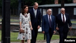 Prince William, the Duke of Cambridge and Catherine, The Duchess of Cambridge meet with Holocaust survivors during their visit at the museum of former German Nazi concentration camp Stutthof in Sztutowo, Poland, July 18, 2017. 