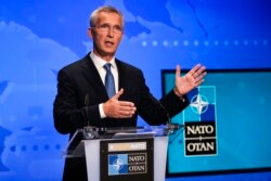 FILE - NATO Secretary-General Jens Stoltenberg speaks at the NATO headquarters in Brussels on August 20, 2021.