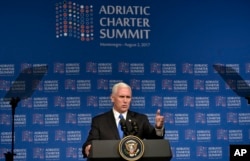 U.S Vice President Mike Pence, gestures during the opening session of the Adriatic Charter Summit in Podgorica, Montenegro, Wednesday, Aug. 2, 2017.